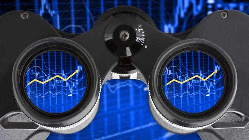 Binoculars showing an investment performance graph in the lenses