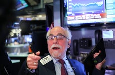 A trader screams out on the stock exchange