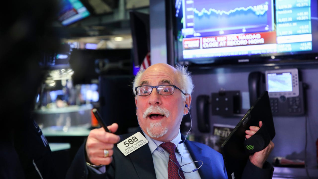 A trader screams out on the stock exchange