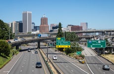 Traffic on the freeway in fron the of Portland business district in Oregon