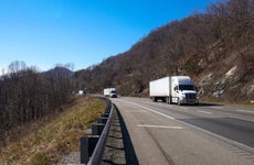 Semi trucks moving on highway