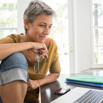 Person looking at their laptop