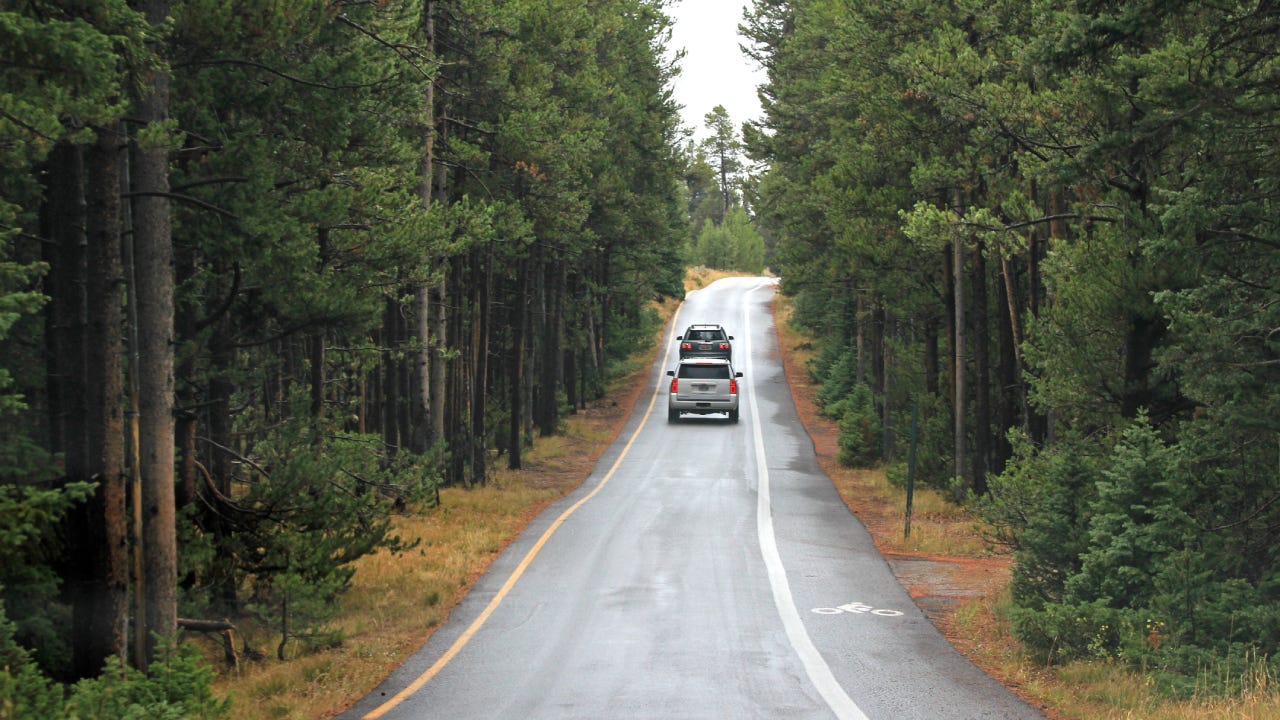 Road leaving Grand Teton National Park heading to Yellowstone