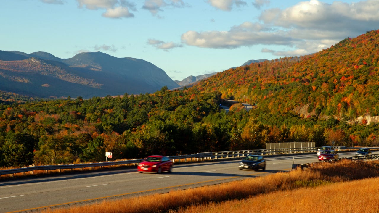 Interstate 93 South in New Hampshire just South of Franconia Notch with traffic on highway