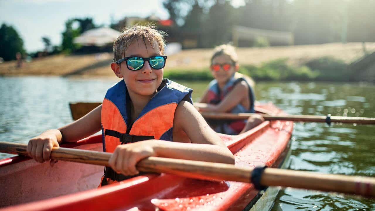 Young boys in rowboat