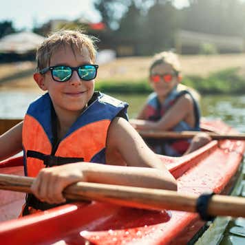 Young boys in rowboat