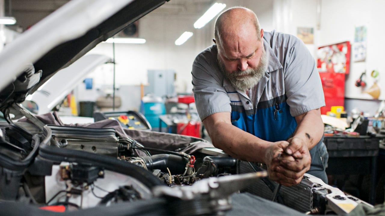 Mechanic uses force to unlock bolt