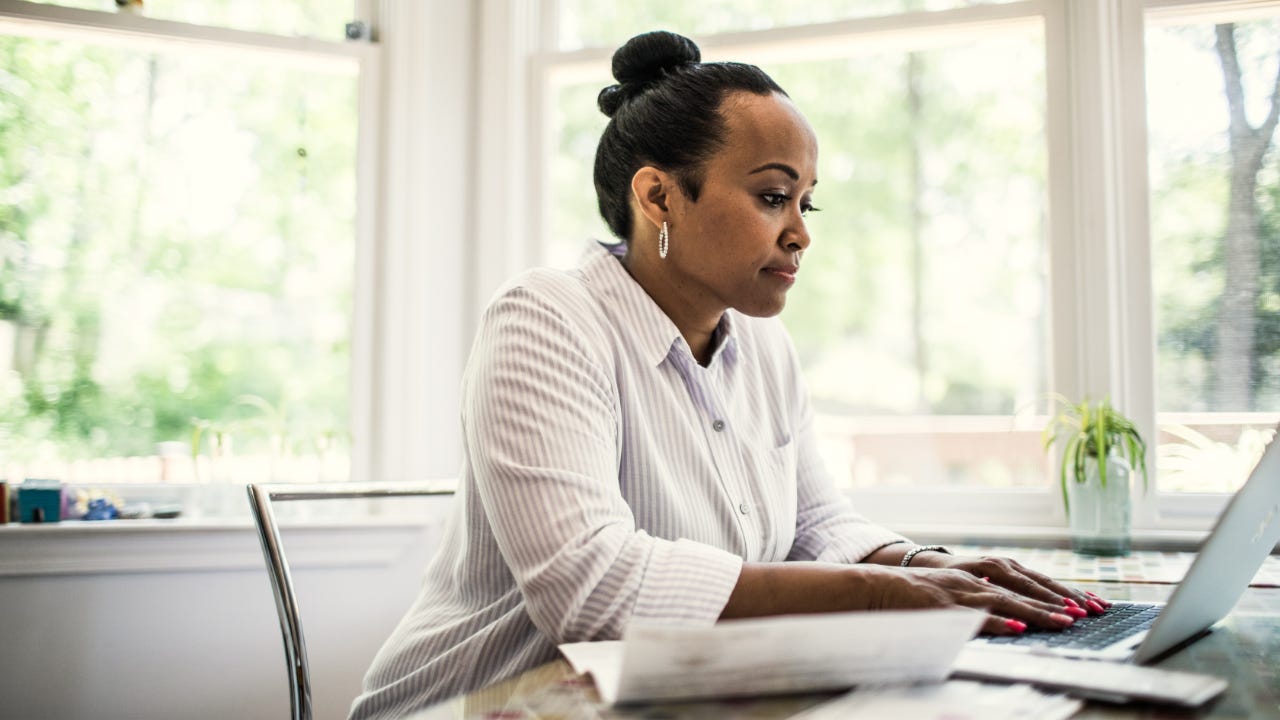 Person doing research on the computer