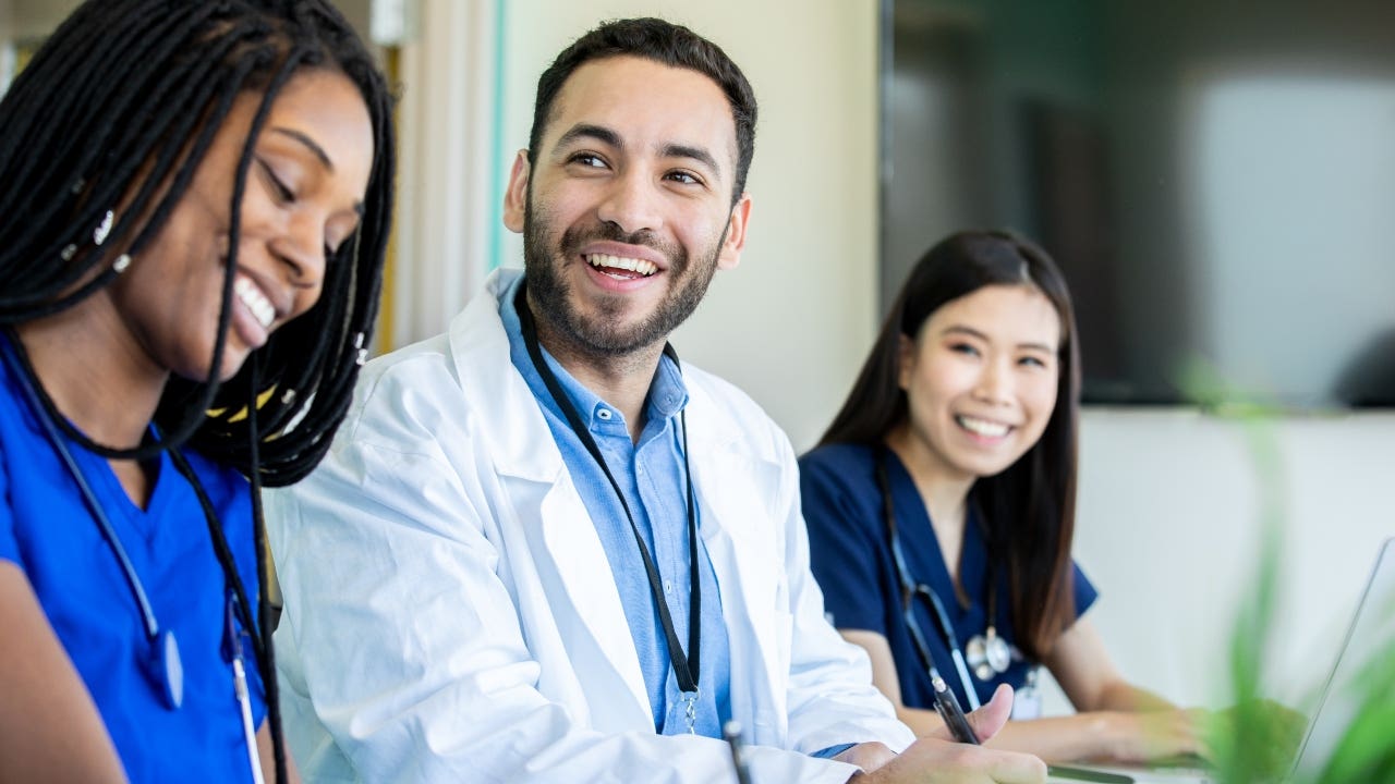 Medical students in a conference room