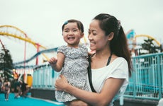 Mother and child at amusement park