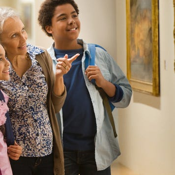 Family looking at art at museum