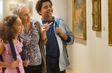 Family looking at art at museum