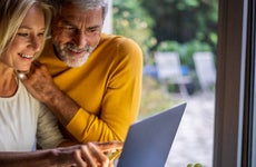 Older couple in front of laptop