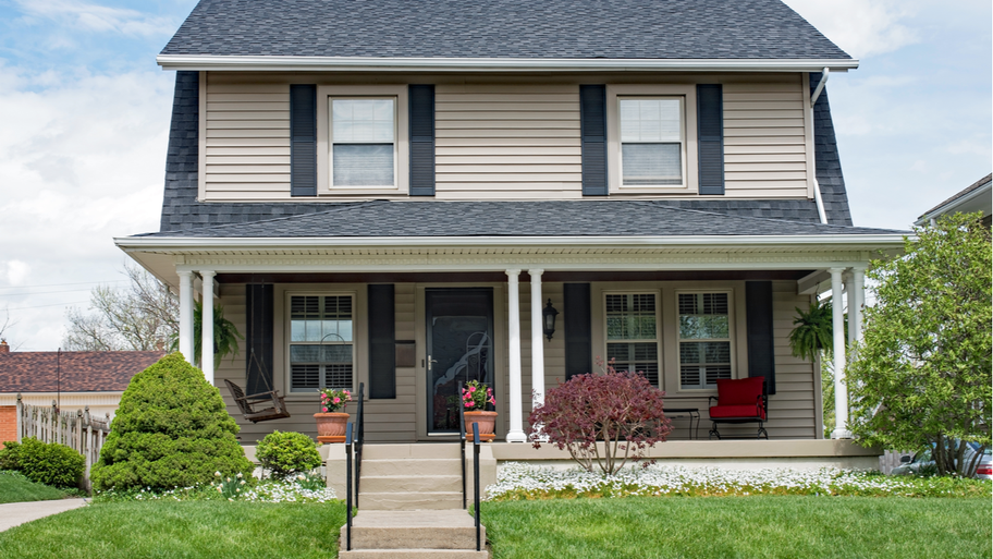 A two-story home with porch