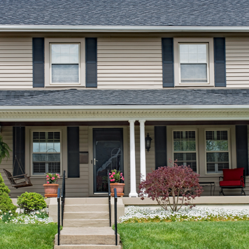 A two-story home with porch