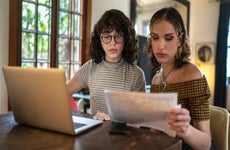 WLW couple with paperwork