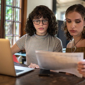 WLW couple with paperwork