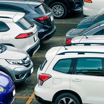 Car parked at parking lot of the airport for rental. Aerial view of car parking lot of the airport. Used luxury car for sale and rental service. Automobile parking space. Car dealership concept.