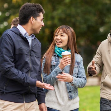 Group of students walks together on college campus