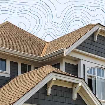 A house roofline in front of a graphic background.