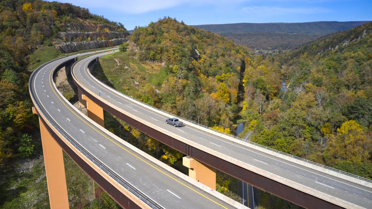 USA, West Virginia, Aerial view ofU.S. Route 48 bridge stretching over Lost River inAppalachian Mountains