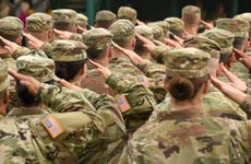 U.S. soldiers give a salute