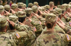 U.S. soldiers give a salute