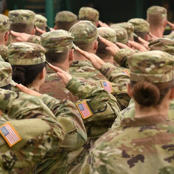 U.S. soldiers give a salute