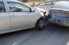 Two cars in collision on roadway