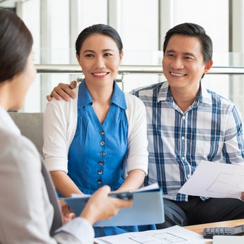 Couple meets with a financial advisor