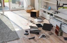 ransacked items on the floor of a living room