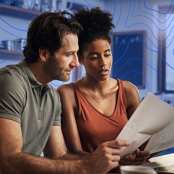 A couple looks at finances.