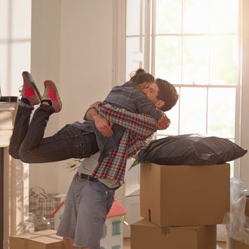 A couple celebrating moving in to a new home