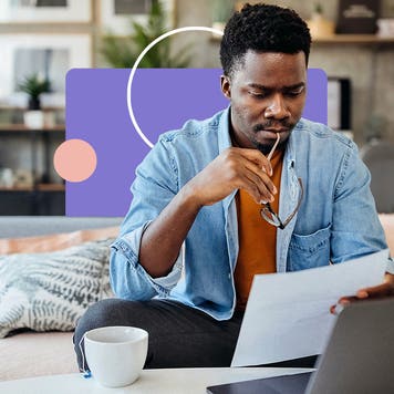 design element including a man sitting down pondering looking at a piece of paper with a laptop and coffee on a table
