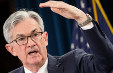 Federal Reserve Chairman Jerome Powell speaks to reporters at a press conference.