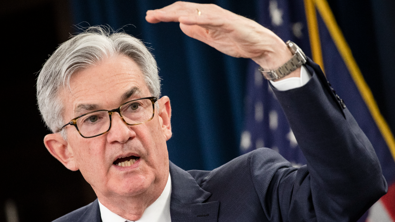 Federal Reserve Chairman Jerome Powell speaks to reporters at a press conference.