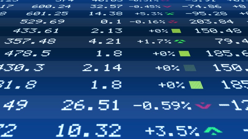 A list of stock prices on a display board
