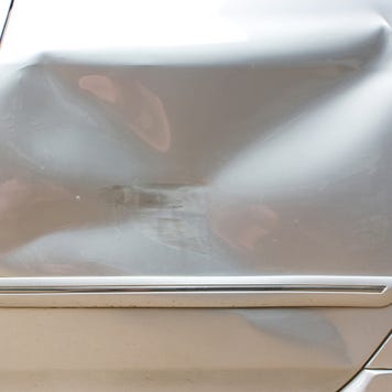 Car crash on back door, passenger seat. Accident of transportation background.