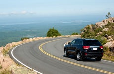 car driving along a road in Acadia National Park