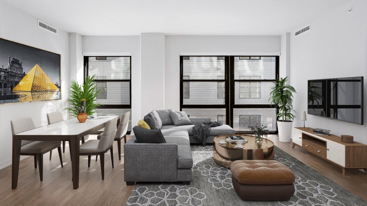 A digitally-staged living room with gray and brown accents