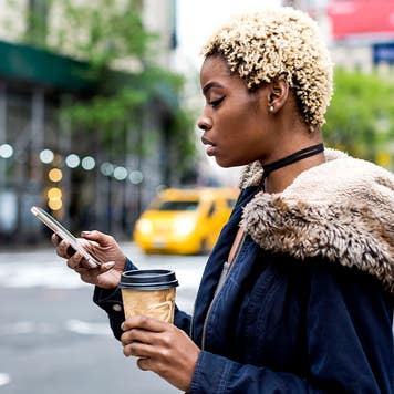 woman looking at her phone in Manhattan