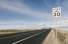 USA, Utah, Salt Lake City, Empty road with speed limit sign