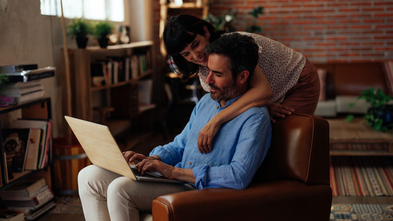 Lovely mid aged couple at home