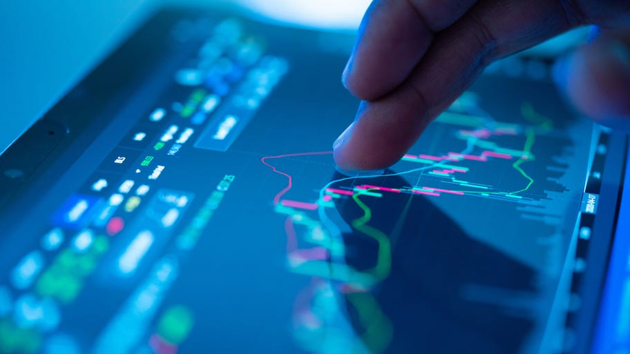 Businessman checking stock market data