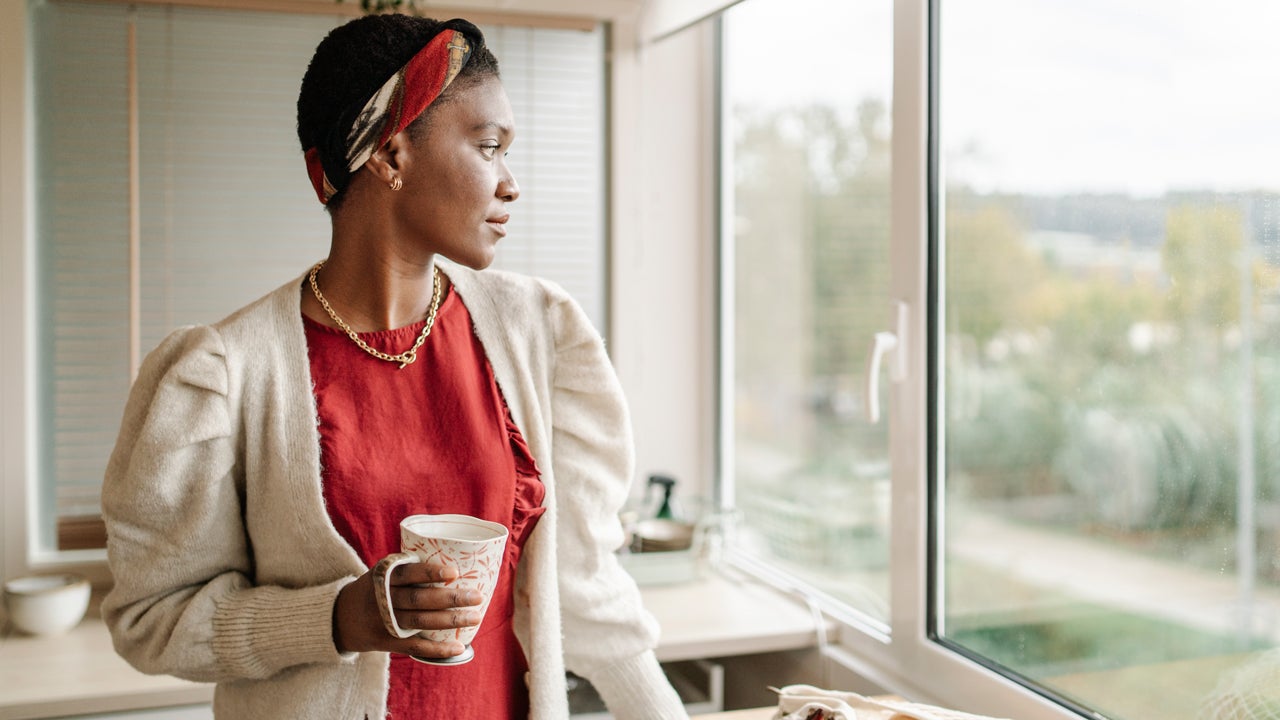 Woman looking out a window