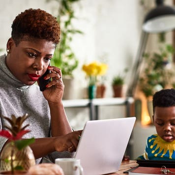 woman on the phone at home with her son