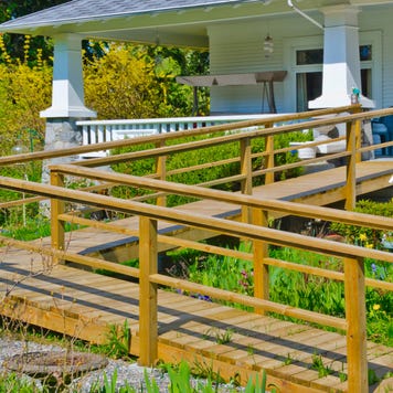 Home with wooden wheelchair ramp