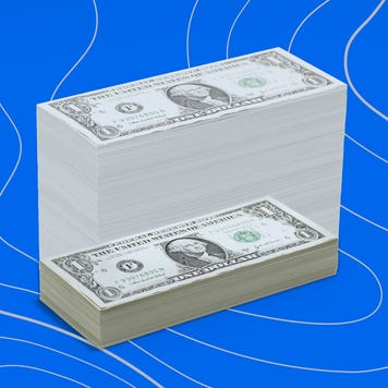 US dollar bills against blue background