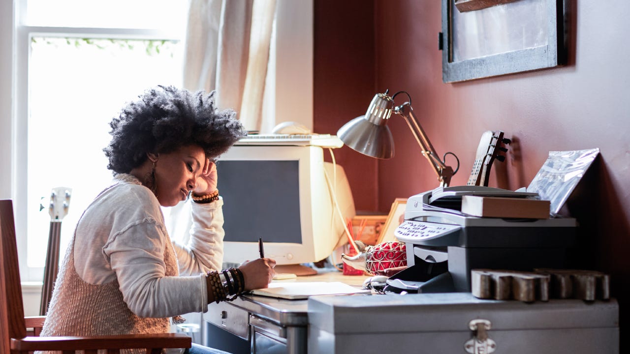 Portrait of woman with cool hair in home office
