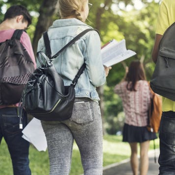 College students walk through campus